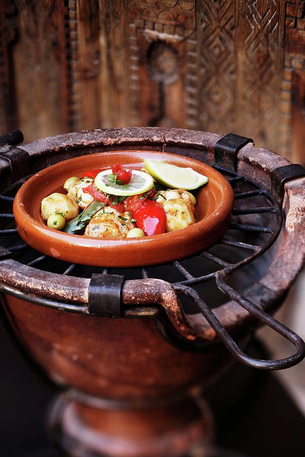 A Plate Of Chicken And Vegetables On A Grill, Marrakesh, Morocco Photograph by Jalag / Markus Bassler