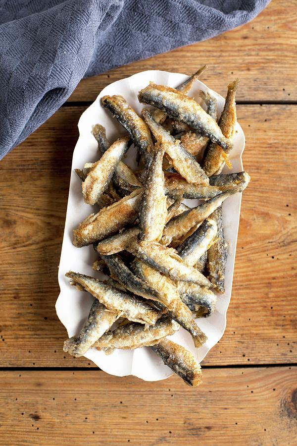A Plate Of Fried Smelt Photograph by Claudia Timmann