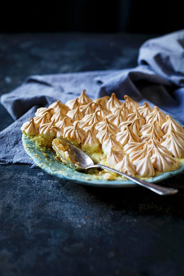 A Plate Of Lemon Meringue Pie With A Spoon Photograph by The Kate Tin