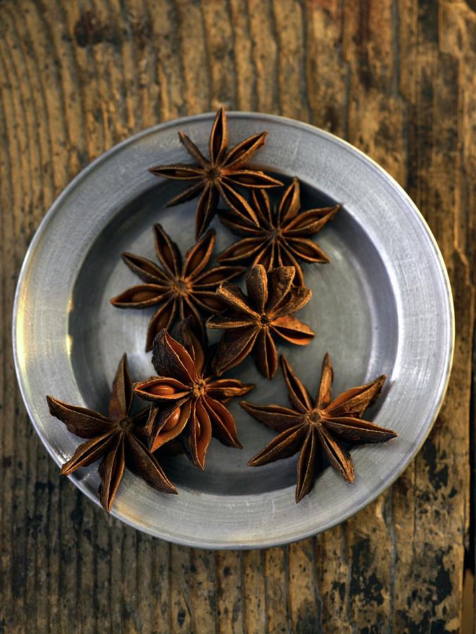 A Plate Of Star Anise seen From Above Photograph by Jalag / Julia Hoersch