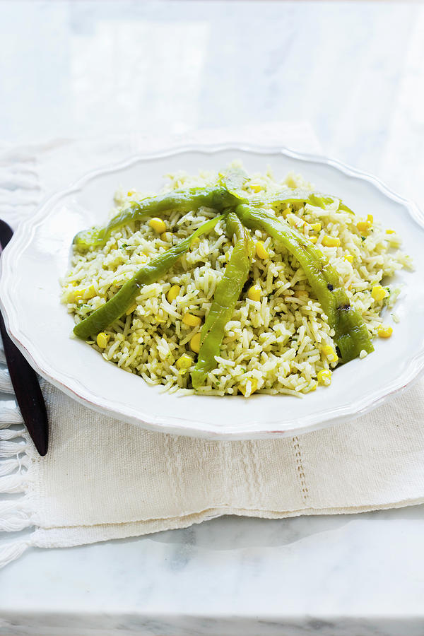 A Plate With Mexican Green Rice Prepared With Chile Poblano, Corn And Cilantro Photograph by Maricruz Avalos Flores