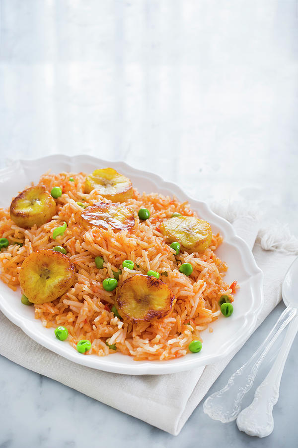 A Plate With Traditional Mexican Red Rice arroz Rojo With Peas And Fried Plantains Photograph by Maricruz Avalos Flores