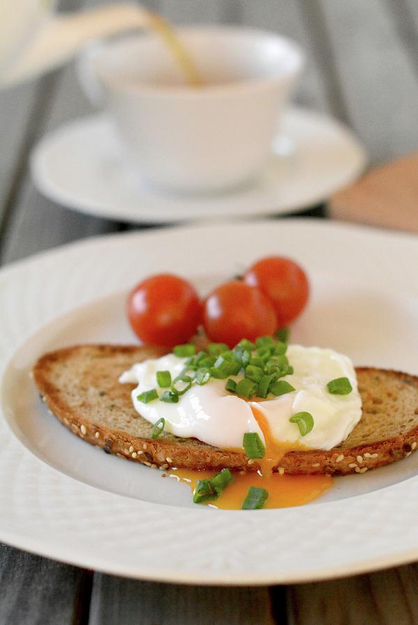 A Poached Egg On Grilled Bread Photograph by Dorota Piekarska