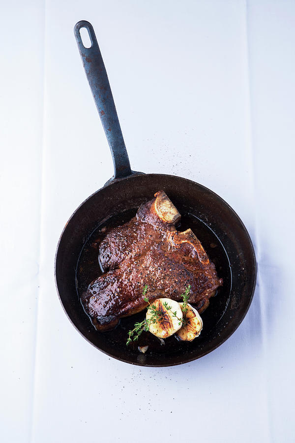 A Porterhouse Steak In A Pan Photograph by Michael Wissing