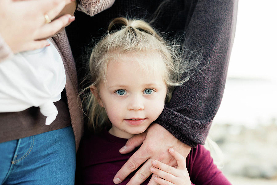 A Portrait Of A Little Blue Eyed Girl And Her Family Photograph by ...