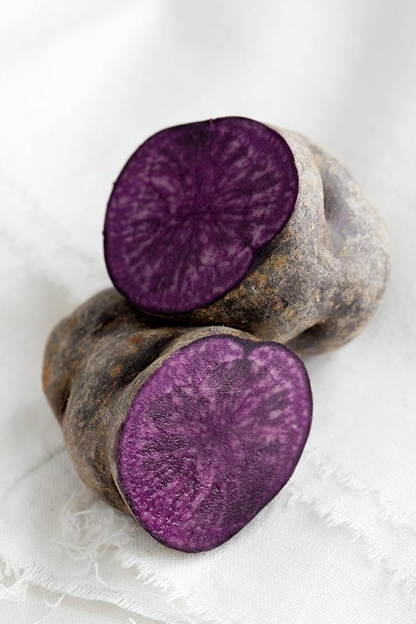 A Purple Potato, Halved Photograph by Lydie Besancon