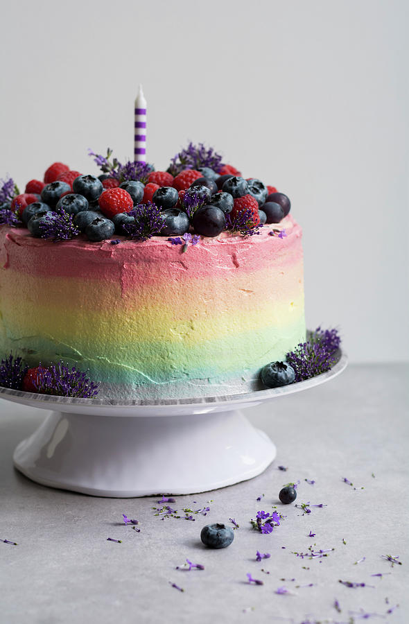 A Rainbow Cake Topped With Fresh Berries Photograph by Joanna Lewicka