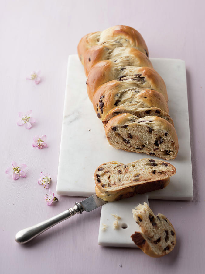 A Raisin Bread Plait, Sliced Photograph by Manuela Rther