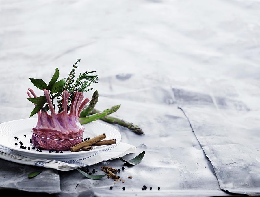 A Raw Rack Of Lamb Photograph by Mikkel Adsbl