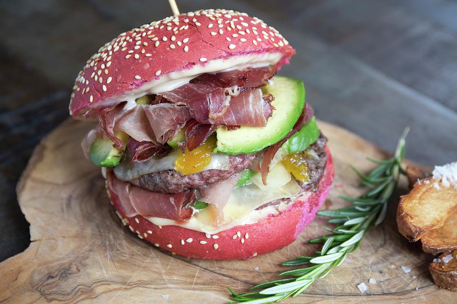 A Red Burger With Beef, Ham, Avocado, Mango And Maltese Sauce Photograph by Jorge Hernandez Dominguez
