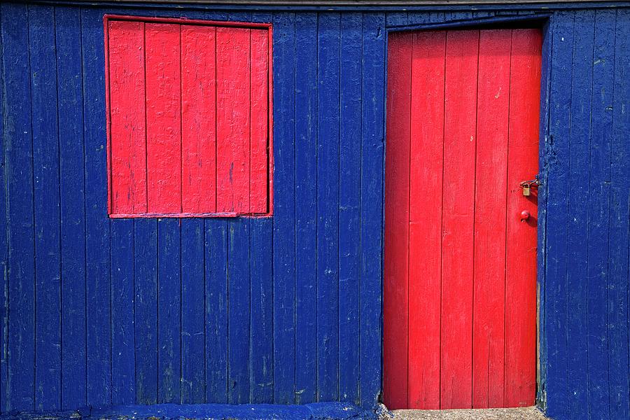 A Red Door And Window On A Blue Wooden Photograph by Design Pics / John Short