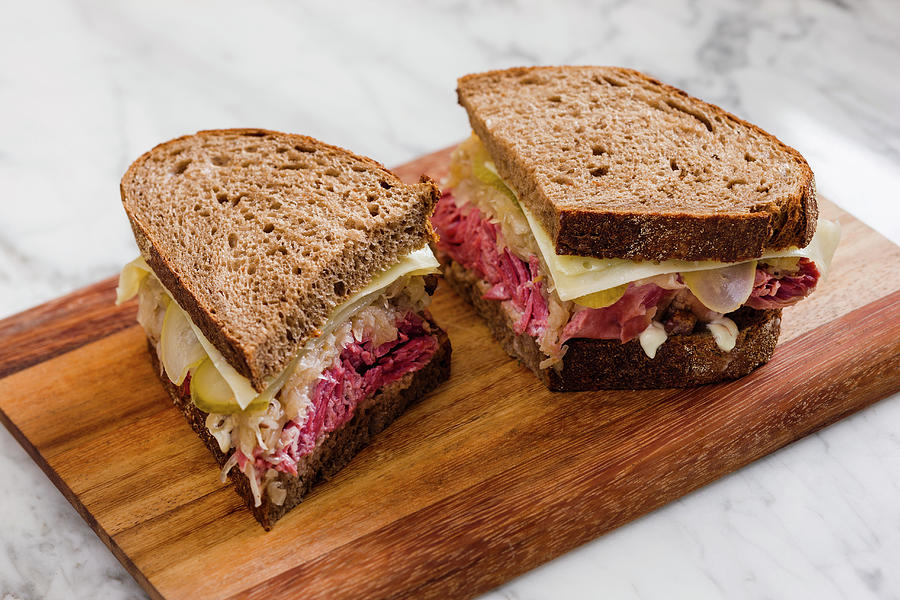 Bread Photograph - A Reuben Sandwich With Pastrami, Sauerkraut And Cheese usa by Andrew Young