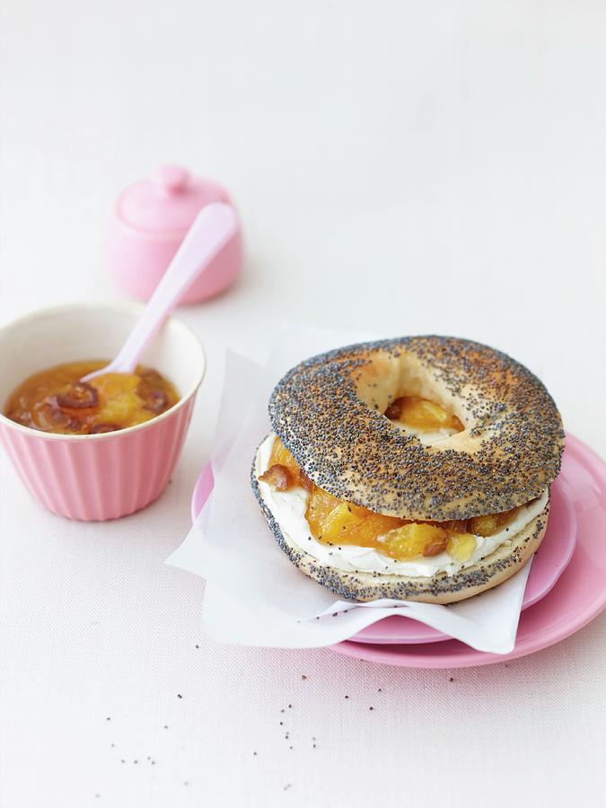 A Ricotta Bagel With Orange And Date Confiture Photograph by Jalag / Wolfgang Schardt