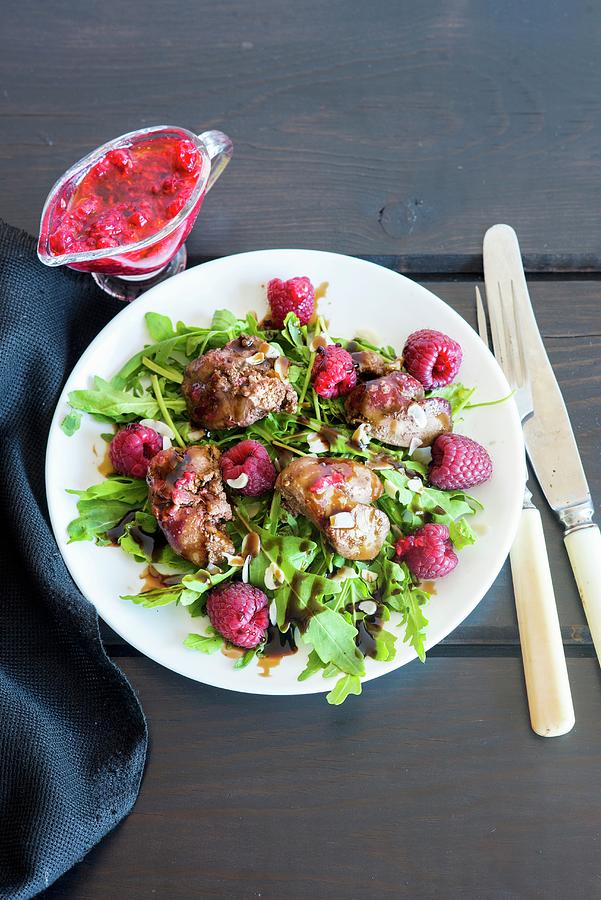 A Rocket Salad With Raspberries, Pan-fried Chicken Liver, Flaked Almonds And Raspberry Dressing Photograph by Irina Meliukh
