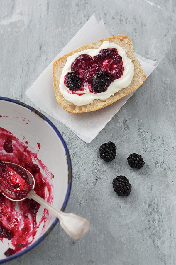 A Roll Spread With Quark And Homemade Blackberry Jam Photograph by Sandra Eckhardt