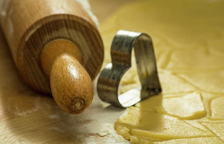 A Rolling Pin, A Cutter And Biscuit Pastry Photograph by Chris Schfer