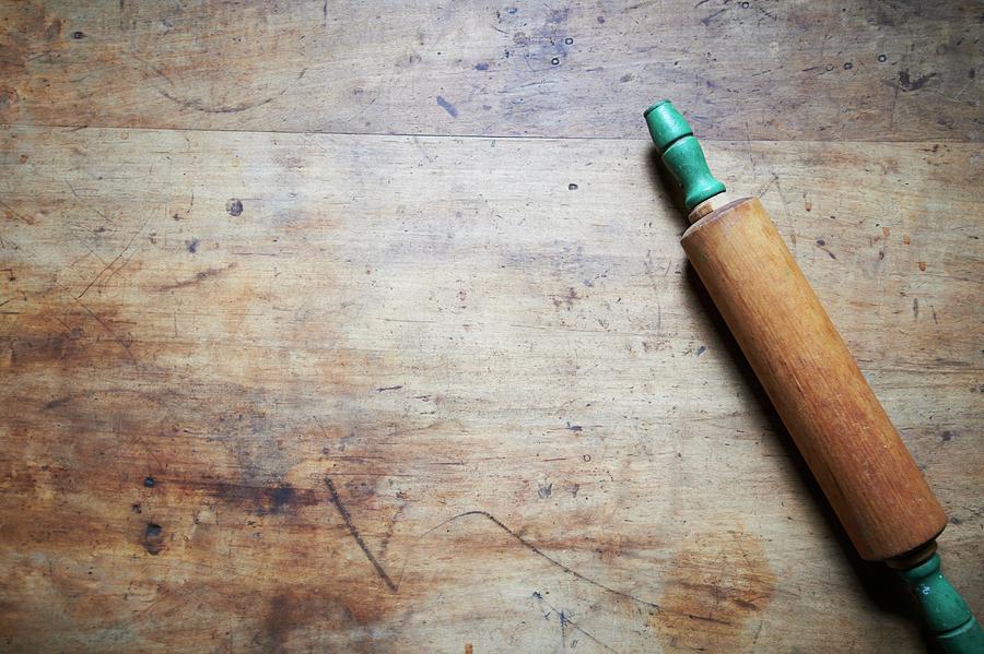 A Rolling Pin On A Wooden Table; From Above Photograph by Rannells, Greg