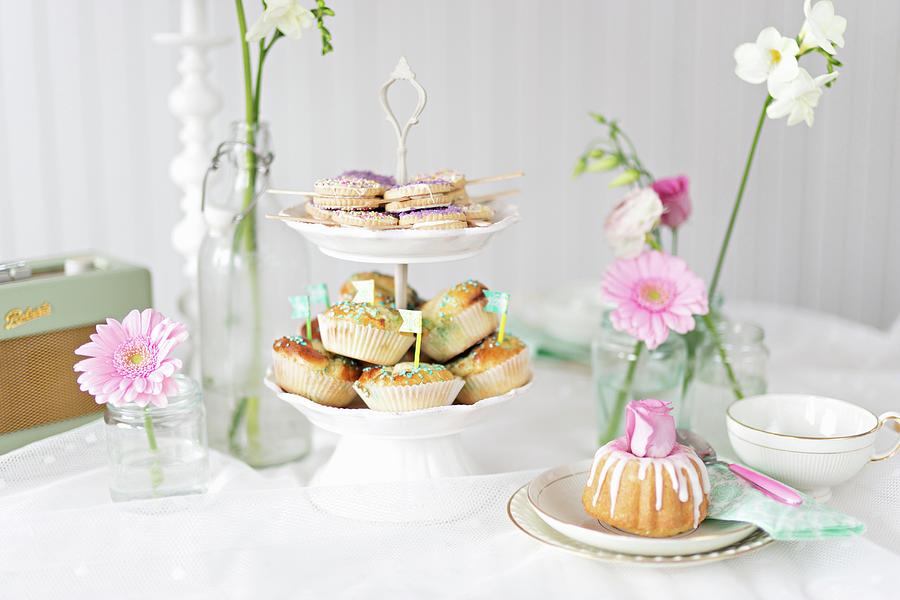 A Romantic Buffet With Biscuit Lollies, Buns And A Mini Bundt Cake Photograph by Cecilia Mller