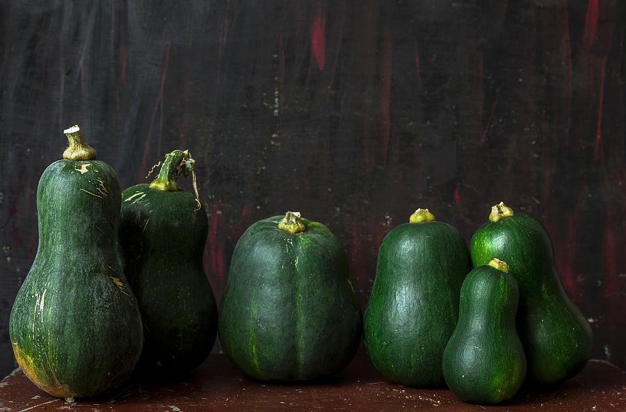 A Row Of Green Squash Photograph by Adel Bekefi