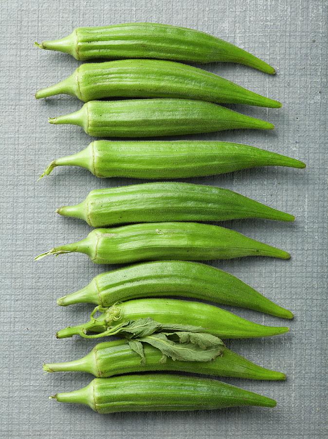 A Row Of Okra Photograph by Rene Comet