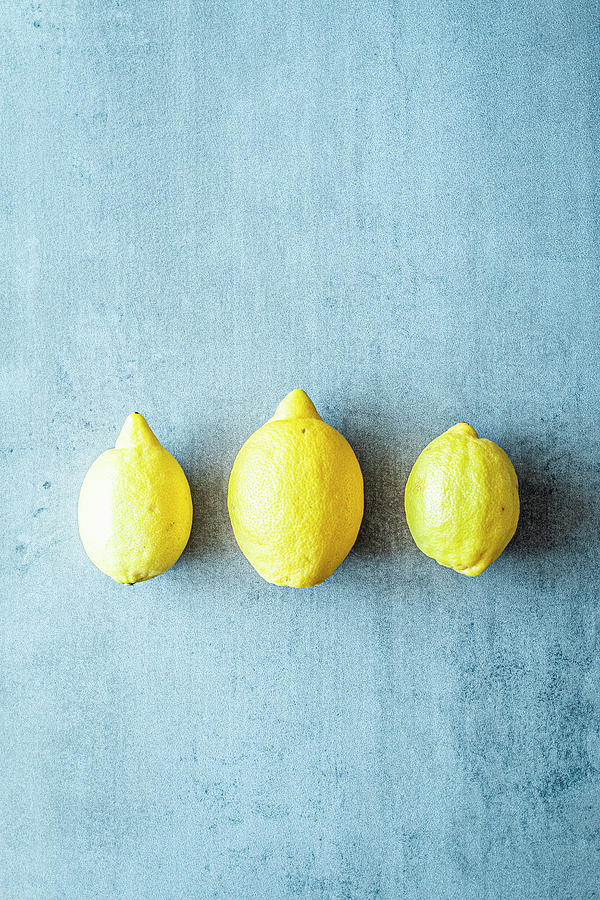 A Row Of Three Lemons Photograph by Simone Neufing