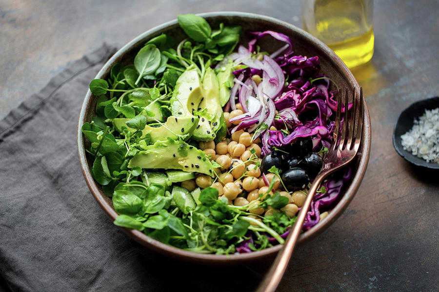 A Salad Bowl With Avocado, Chick Peas, Red Cabbage And Water Cress Photograph by Lara Jane Thorpe