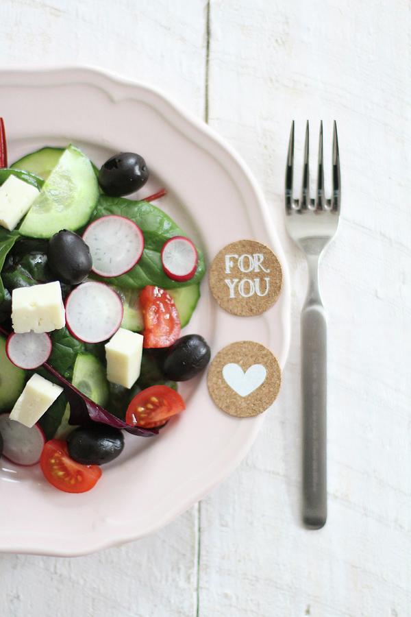 A Salad Of Cucumbers, Tomatoes, Olives, Radishes And Feta Cheese Photograph by Sylvia E.k Photography