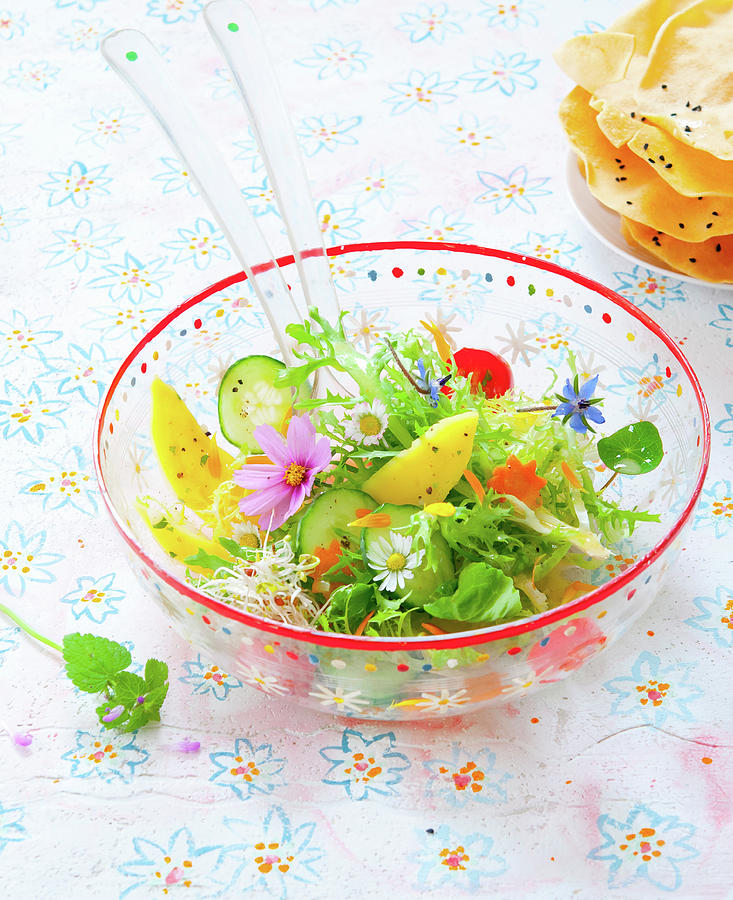 A Salad With Flowers In A Glass Bowl Photograph by Udo Einenkel