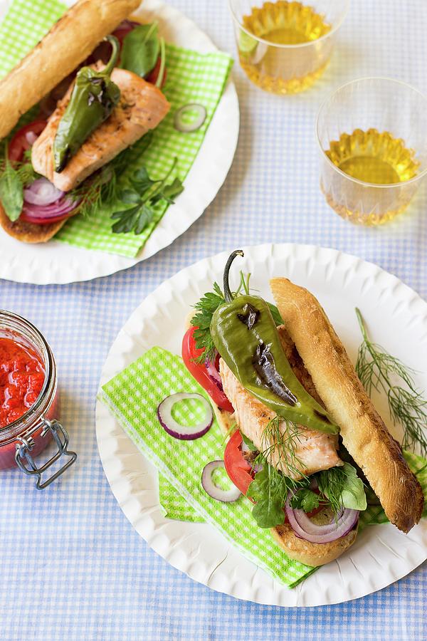 A Sandwich With Salmon Trout, Tomatoes, Onions, Dill, Rocket, Parsley And Grilled Peppers Photograph by Zuzanna Ploch