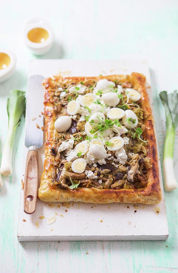 A Savoury Puff Pastry Tart With Leeks, Wild Mushrooms, Bacon And Quails Eggs Photograph by Great Stock!