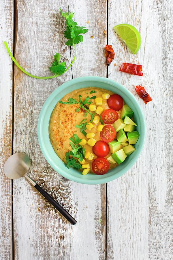 A Savoury Smoothie Bowl With Sweetcorn, Avocado, Tomatoes And Chilli Photograph by Tina Engel