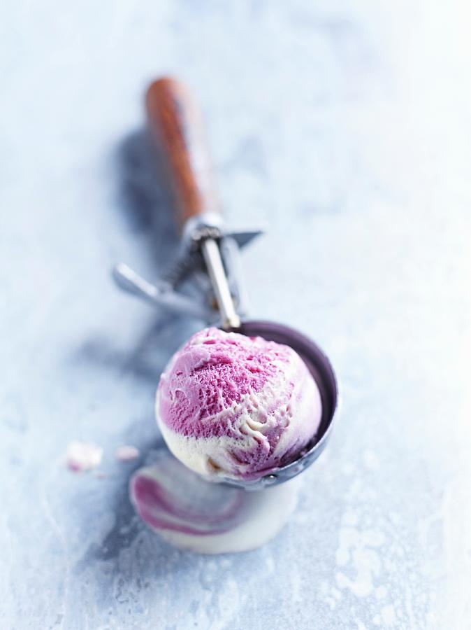 A Scoop Of Blueberry Ice Cream In An Ice Cream Server Photograph by Brachat, Oliver
