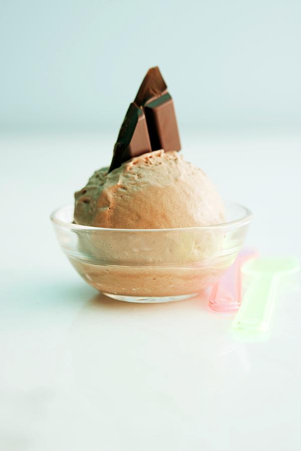A Scoop Of Chocolate Ice Cream In A Bowl Photograph by Michael Wissing