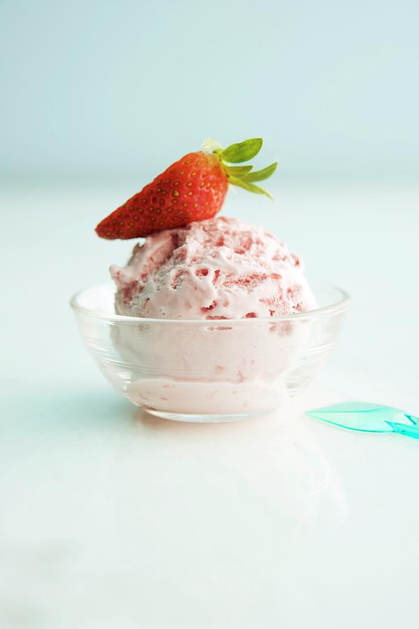A Scoop Of Strawberry Ice Cream In A Bowl Photograph by Michael Wissing