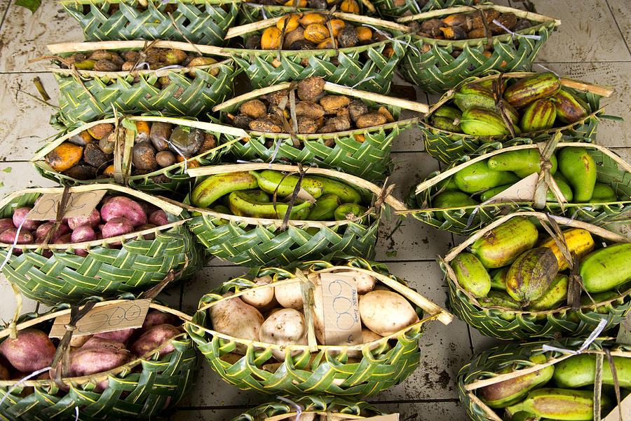 A Selection Of Tropical Vegetables Is Offered In Baskets Made From Palm Fonds At The Port Vila Markets. Photograph by Don Fuchs