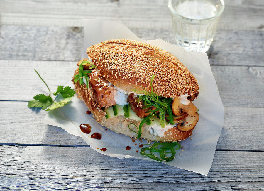 A Sesame Bun With Tuna, Seaweed Salad And Mushrooms Photograph by Stefan Schulte-ladbeck