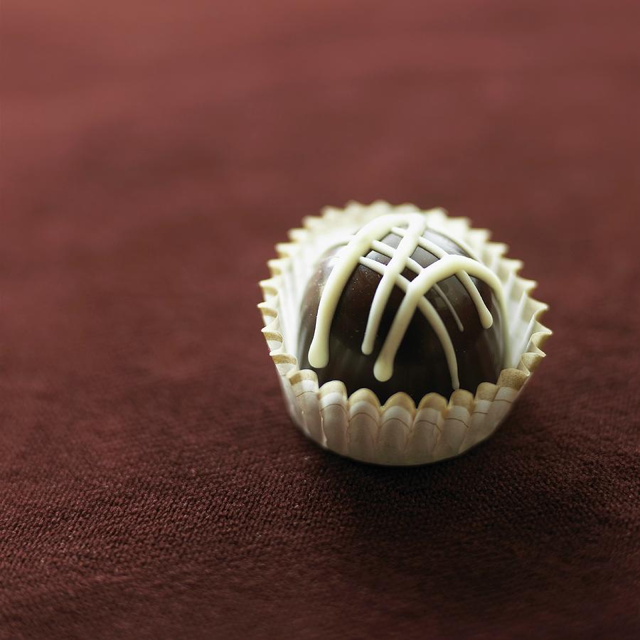 A Single Gourmet Chocolate Bon Bon Photograph by Vincent Noguchi Photography