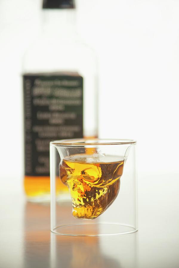 A Skull Shot Glass Photograph by William Boch