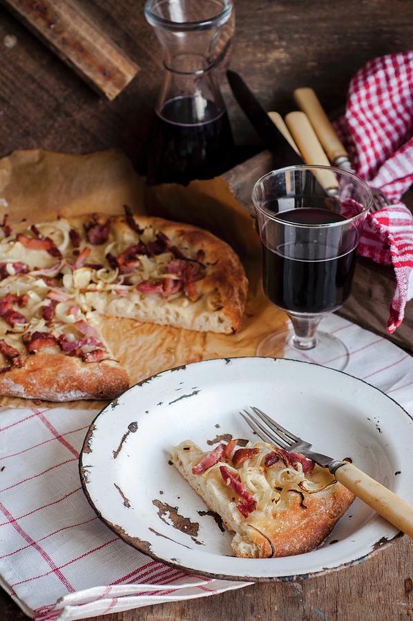 A Slice Cut Out Of A Rustic Pizza With Bacon And Onion Photograph by Irina Meliukh