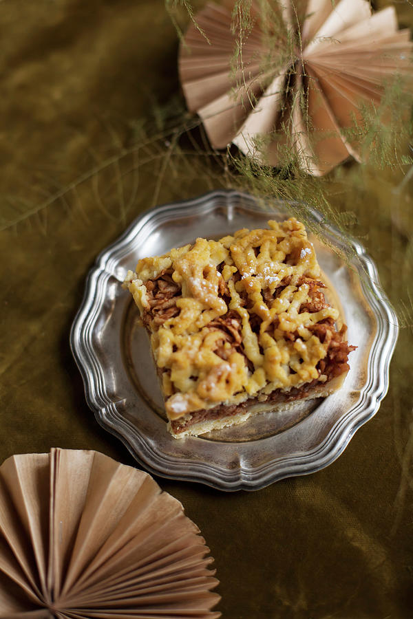 A Slice Of Apple Cake With Streusel On A Pewter Plate Photograph by Alicja Koll