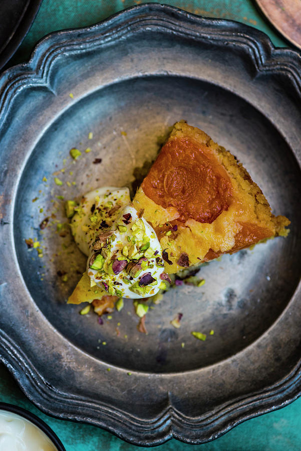 A Slice Of Apricot And Olive Oil Cake Photograph by Hein Van Tonder
