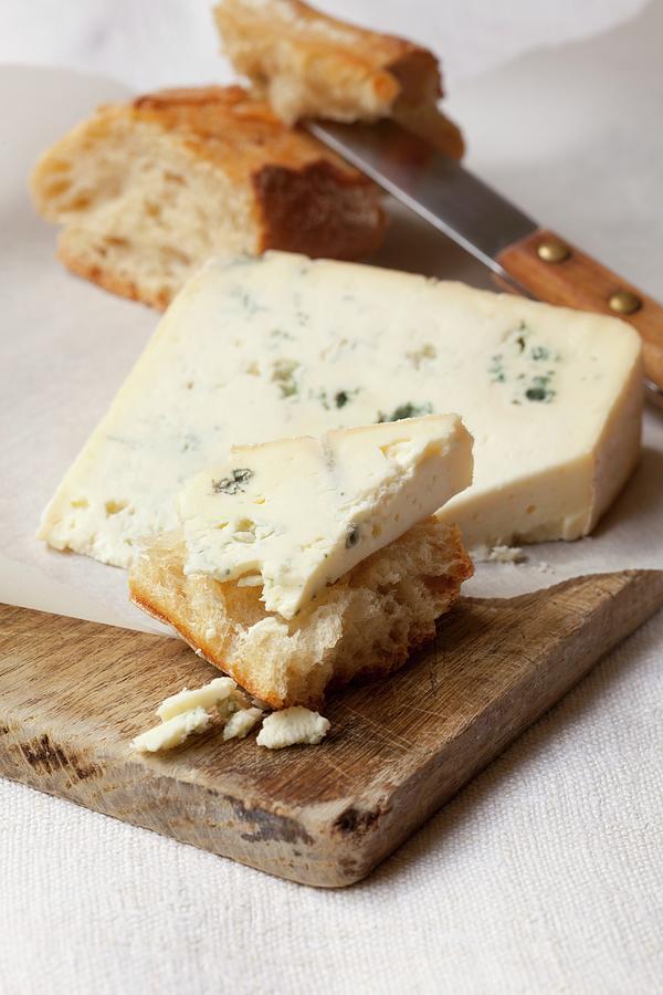 A Slice Of Bleu Dauvergne Cheese With Bread Photograph by Hilde Mche