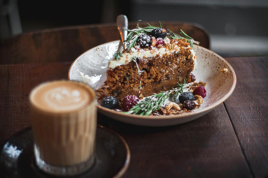 A Slice Of Carrot Cake With Berries And Rosemary Photograph by Mel Boehme