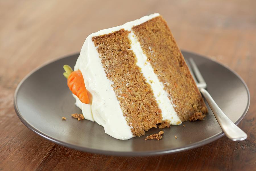 Cheese Photograph - A Slice Of Carrot Cake With Cream Cheese Icing usa by Eising Studio - Food Photo & Video