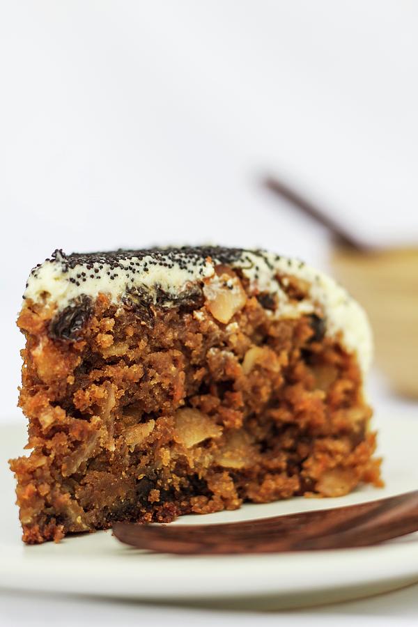A Slice Of Carrot Cake With Poppy Seeds Photograph by Elle Brooks