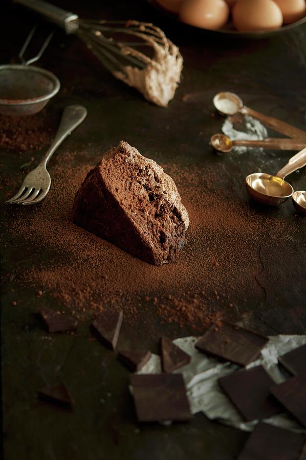 A Slice Of Chocolate Cake, Baking Ingredients And Utensils Photograph by Kristy Snell