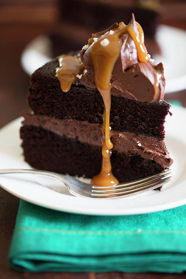 A Slice Of Chocolate Cake With Caramel Sauce Photograph by Eising Studio