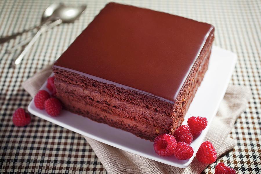 A Slice Of Chocolate Cake With Fresh Raspberries Photograph by Stepien, Malgorzata