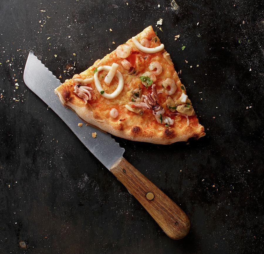 A Slice Of Frutti Di Mare Pizza Photograph by Ludger Rose