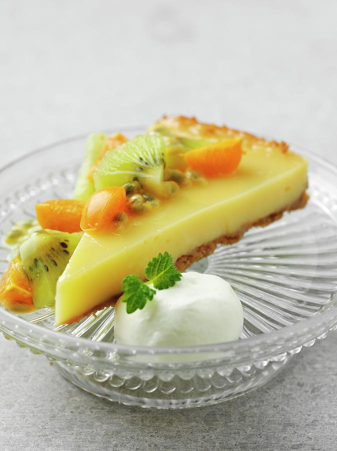 A Slice Of Lemon Curd Cake With Exotic Fruit Photograph by Pepe Nilsson